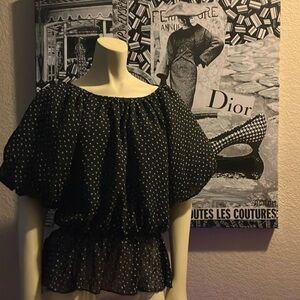 Black and white polka dot blouse by Nasty Gal.